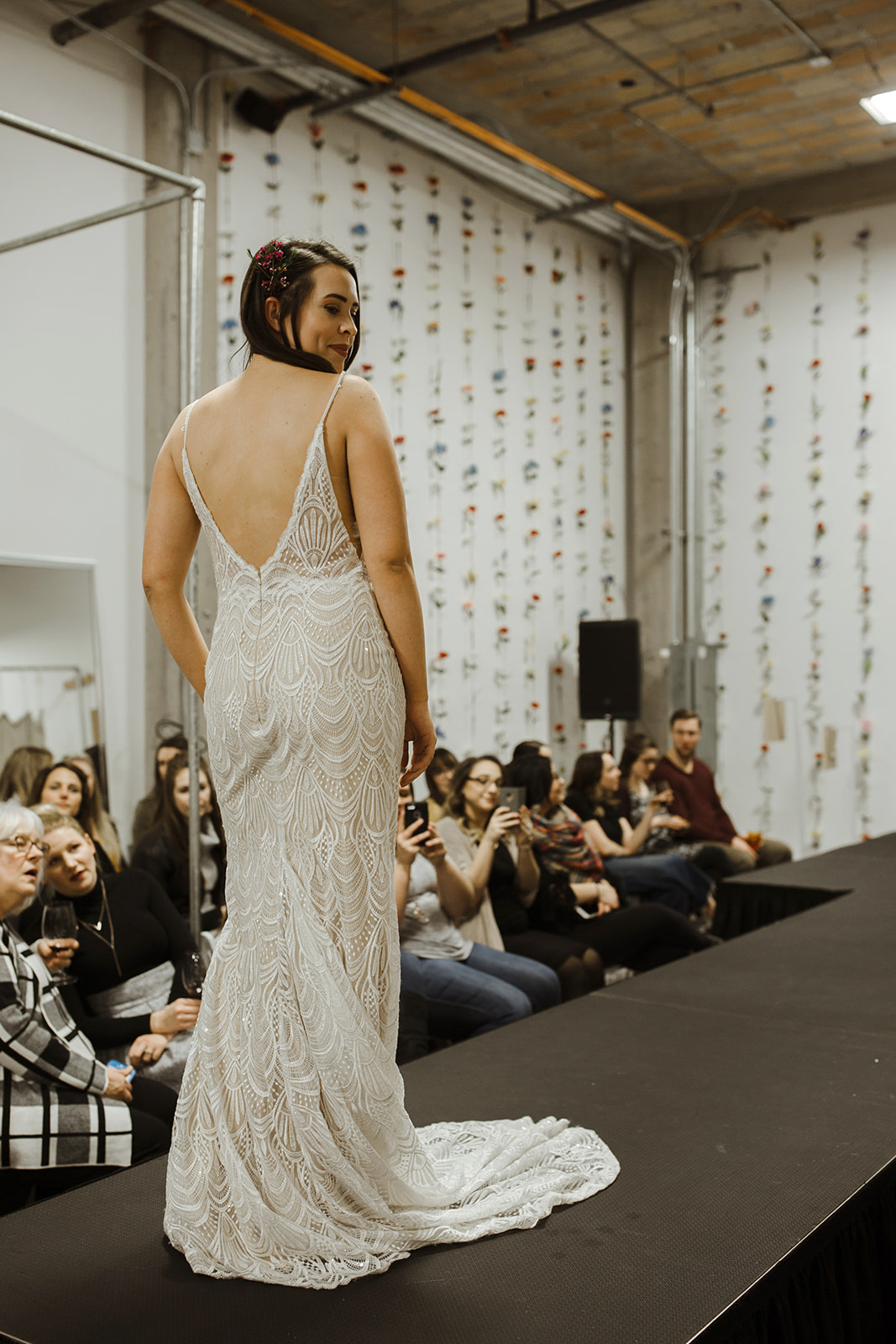 spokane wedding dress fashion show model over the shoulder glance