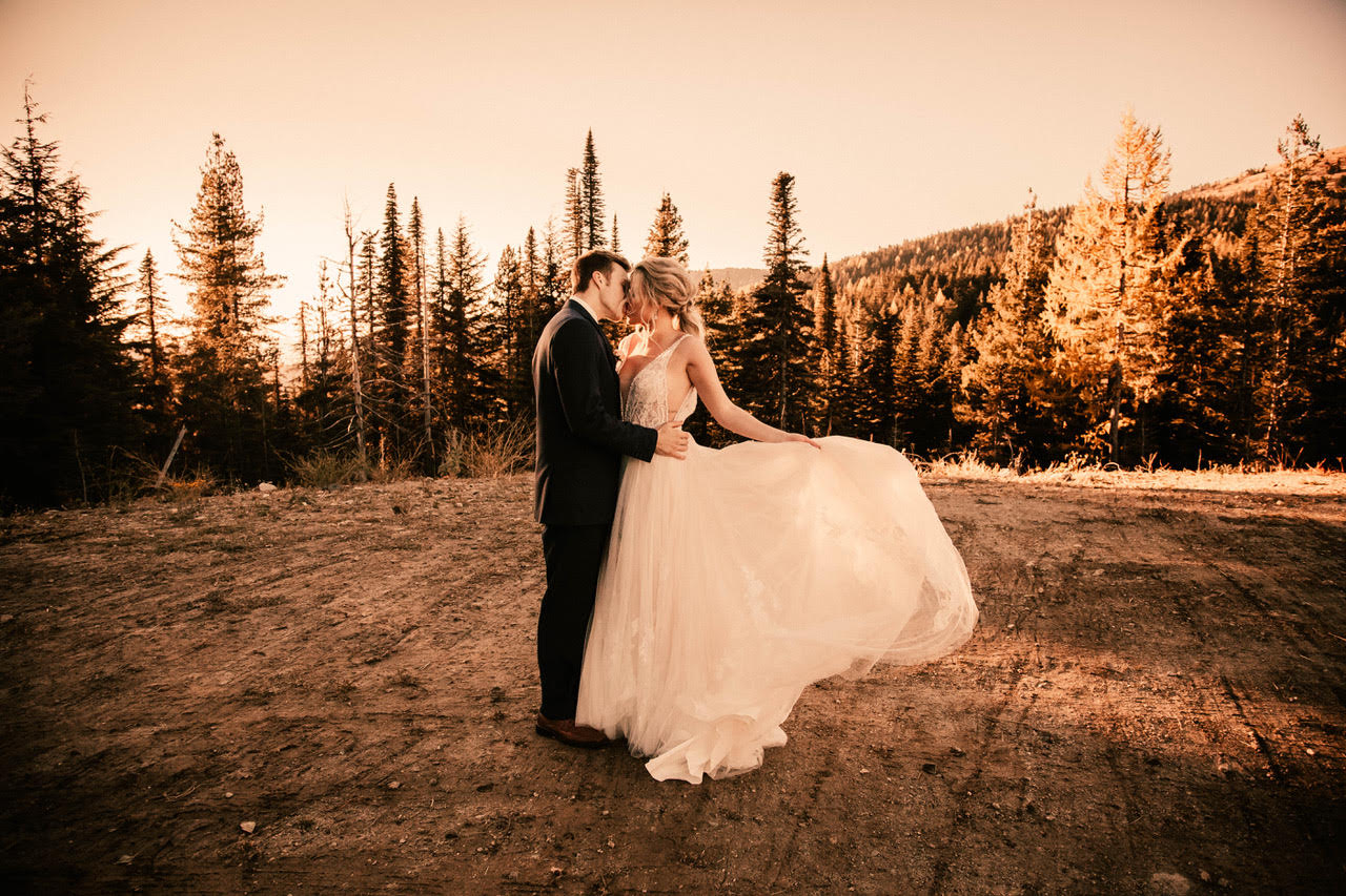 swirling and kissing image wedding dress spokane