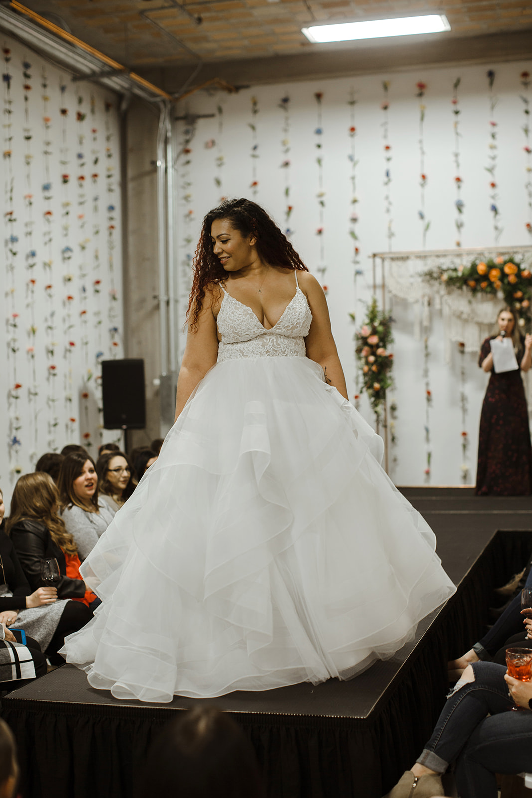 spokane wedding dress fashion show model walking the runway liz l'amour