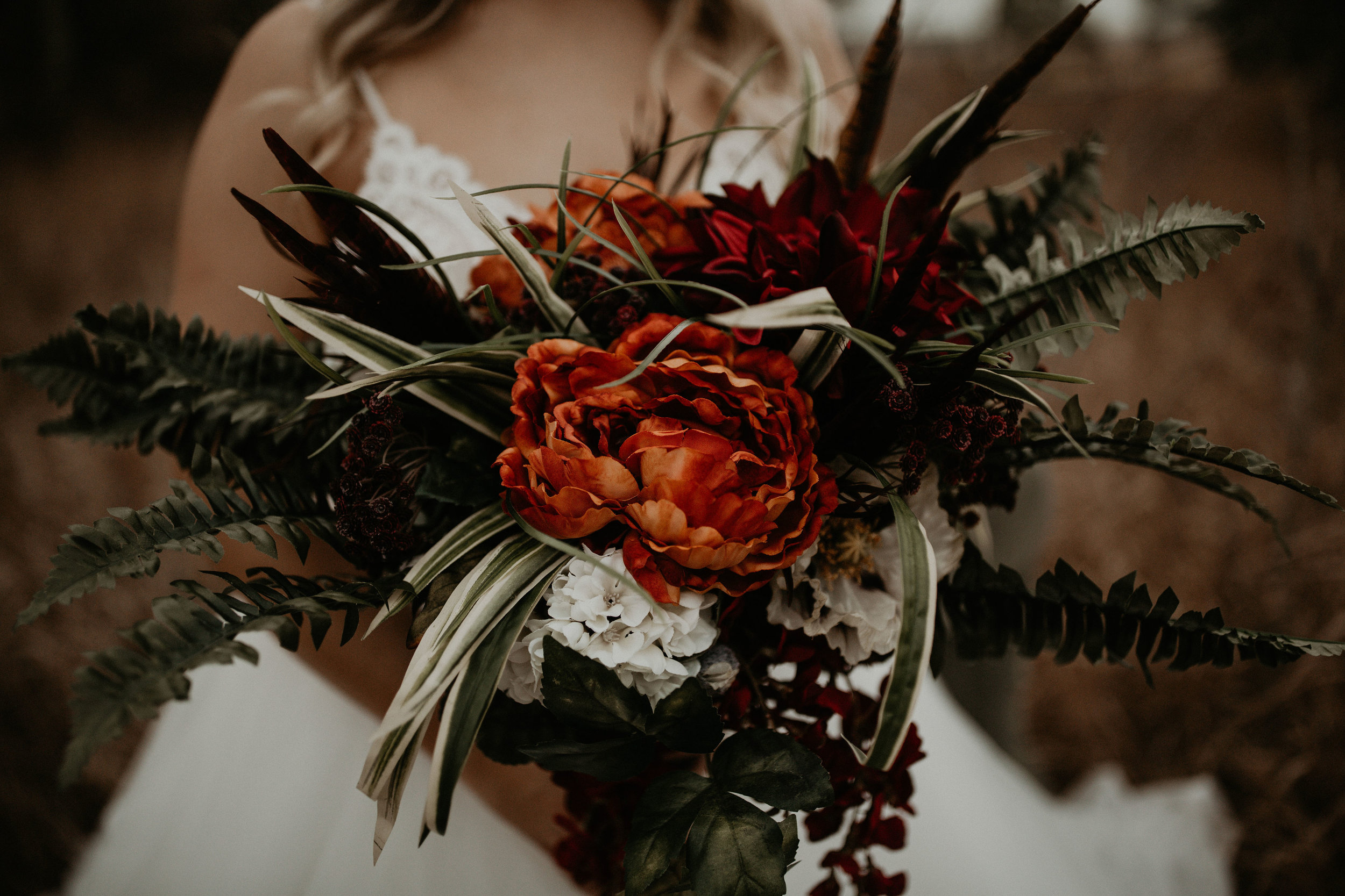 orange floral bridal bouquet image