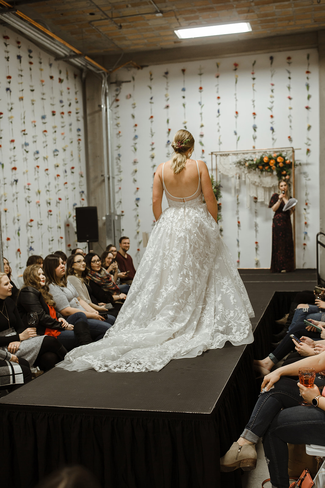 spokane wedding dress low back fashion show bridal model pony tail