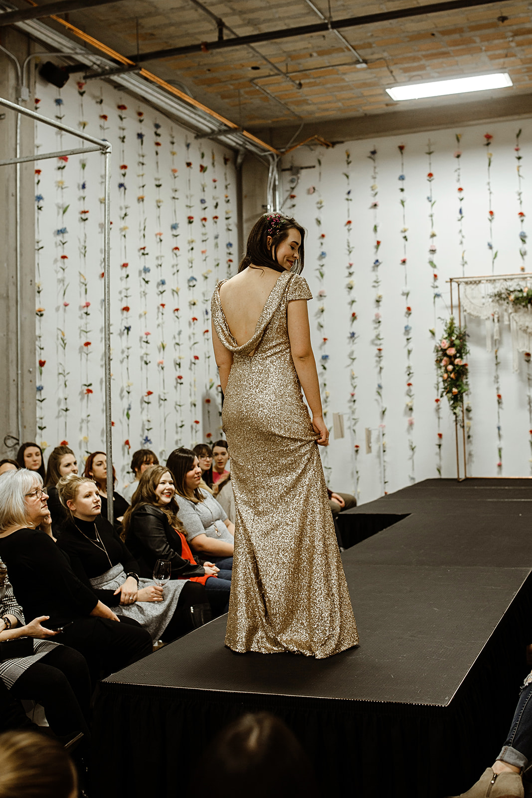 spokane wedding dress gold sparkle swoop back fashion show