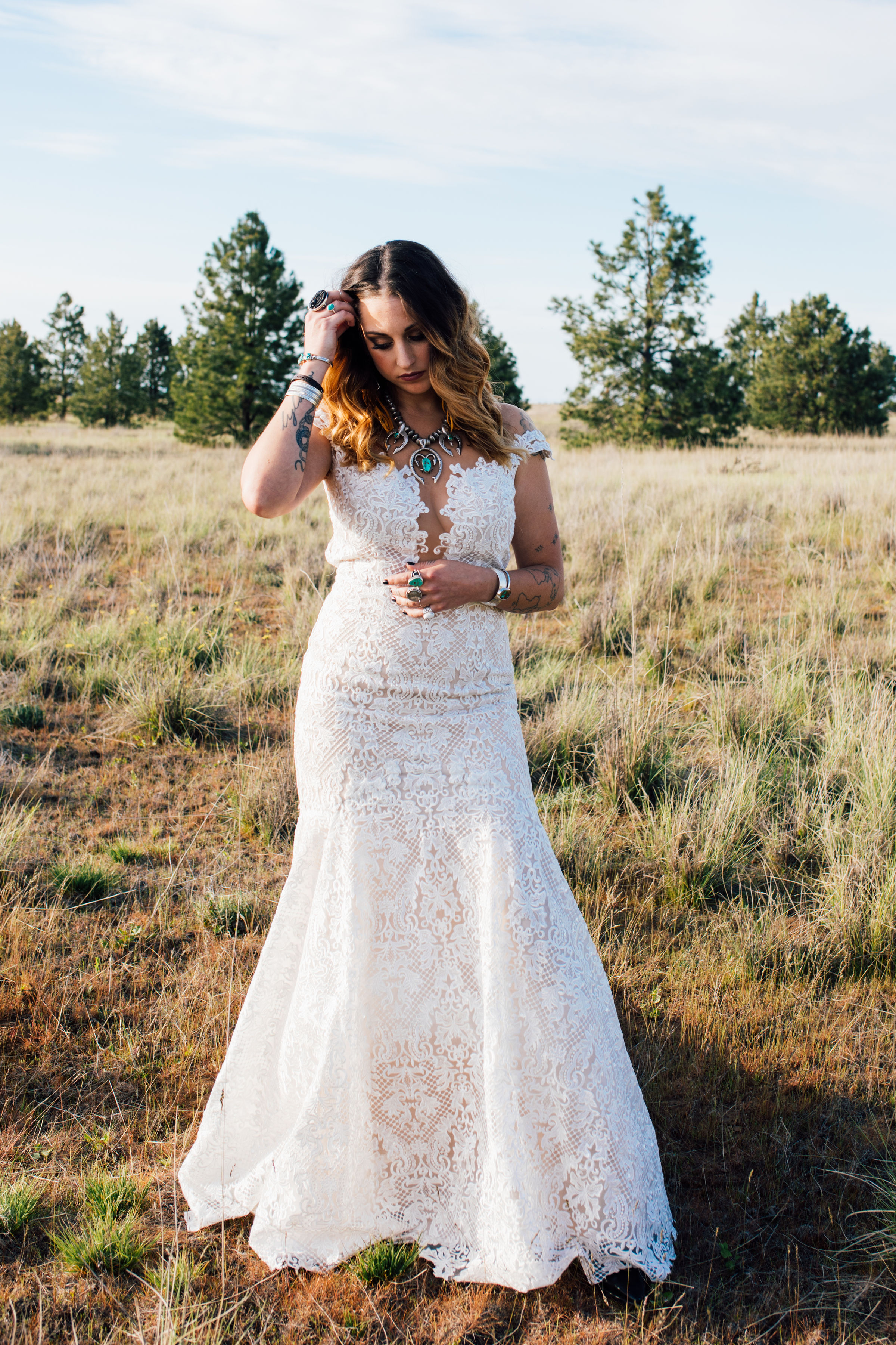 cool elopement spokane wedding dress bride field trees PNW lace