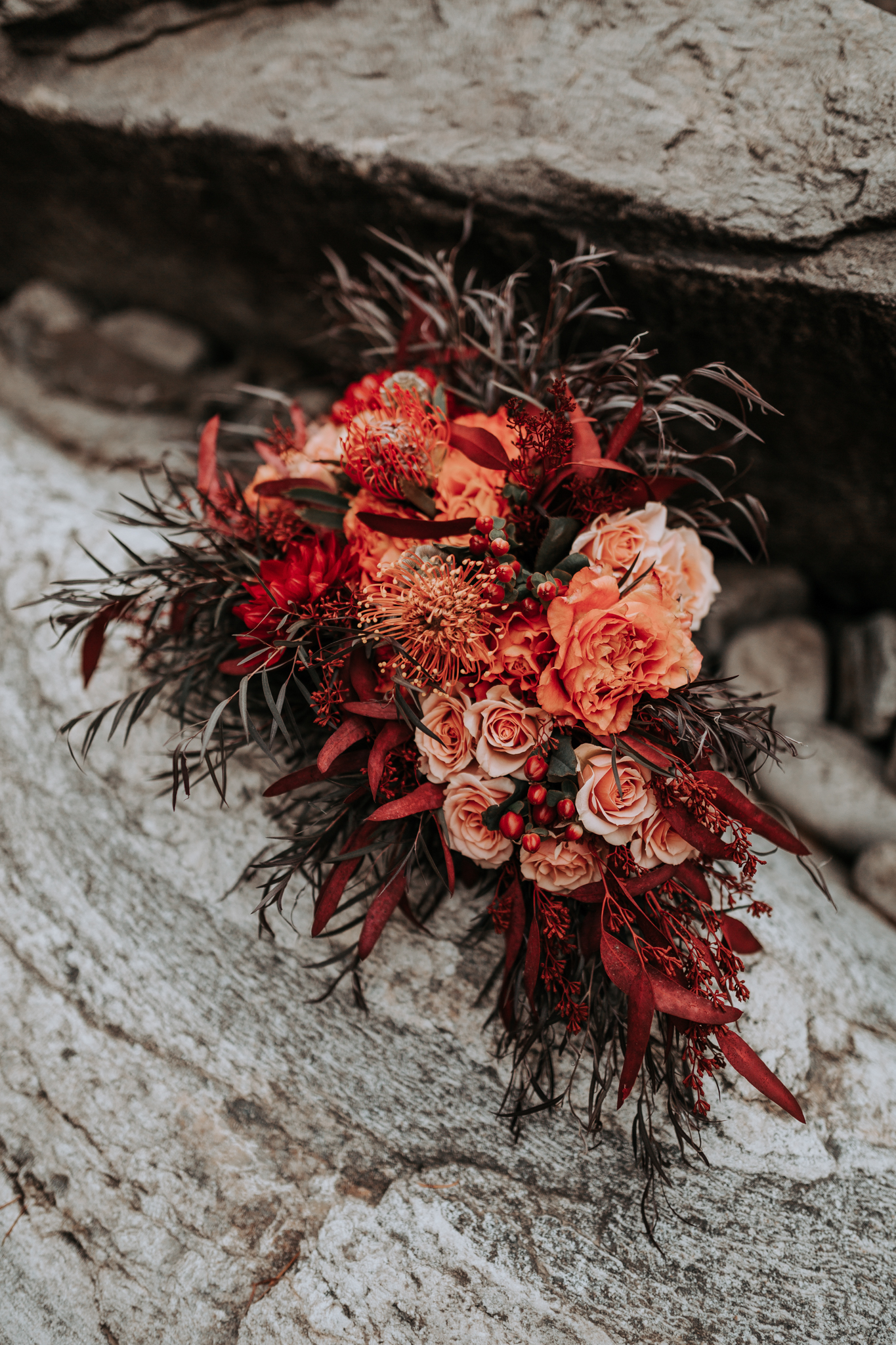 orange and red floral spokane wedding bouquet