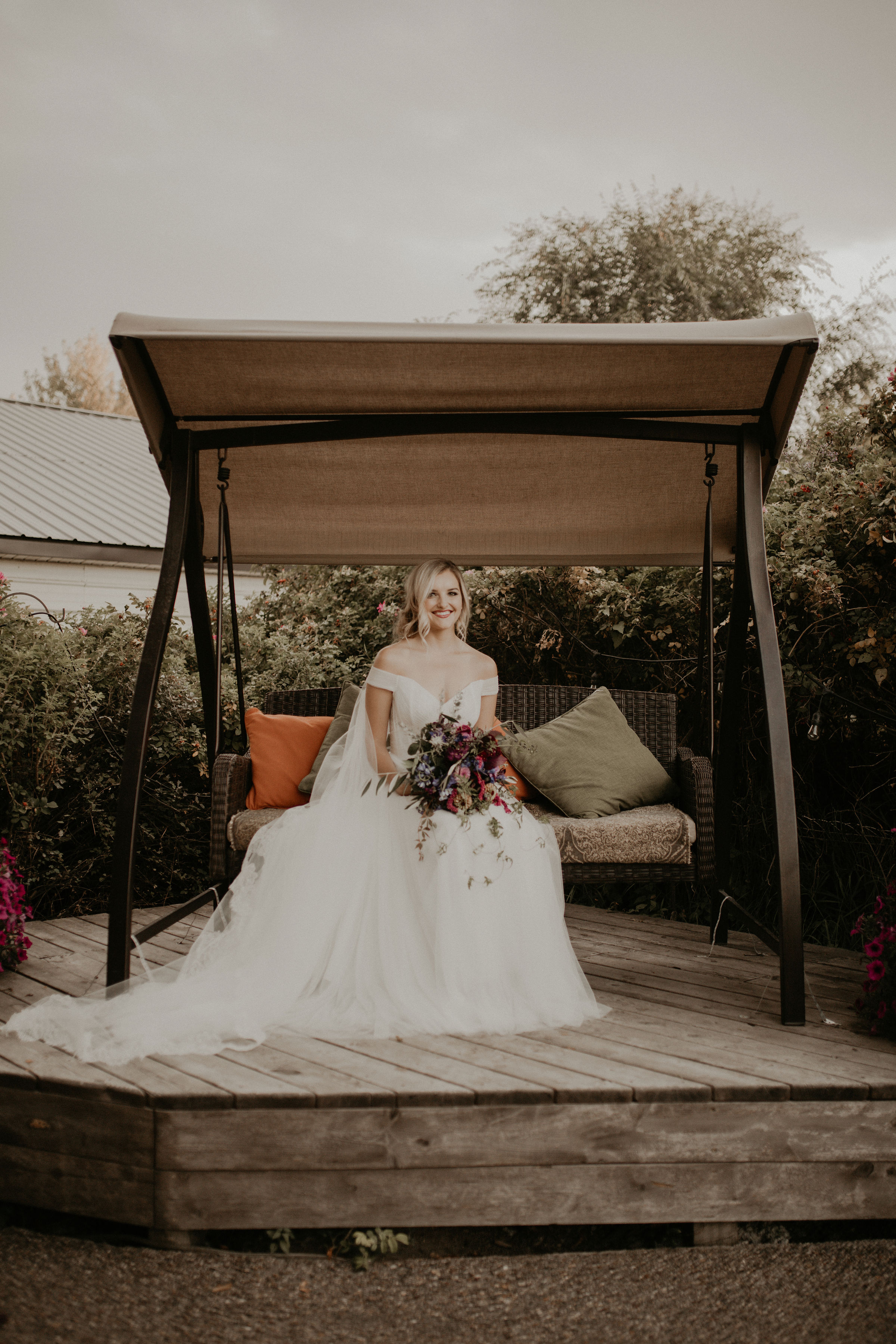 porch swing wedding spokane bride