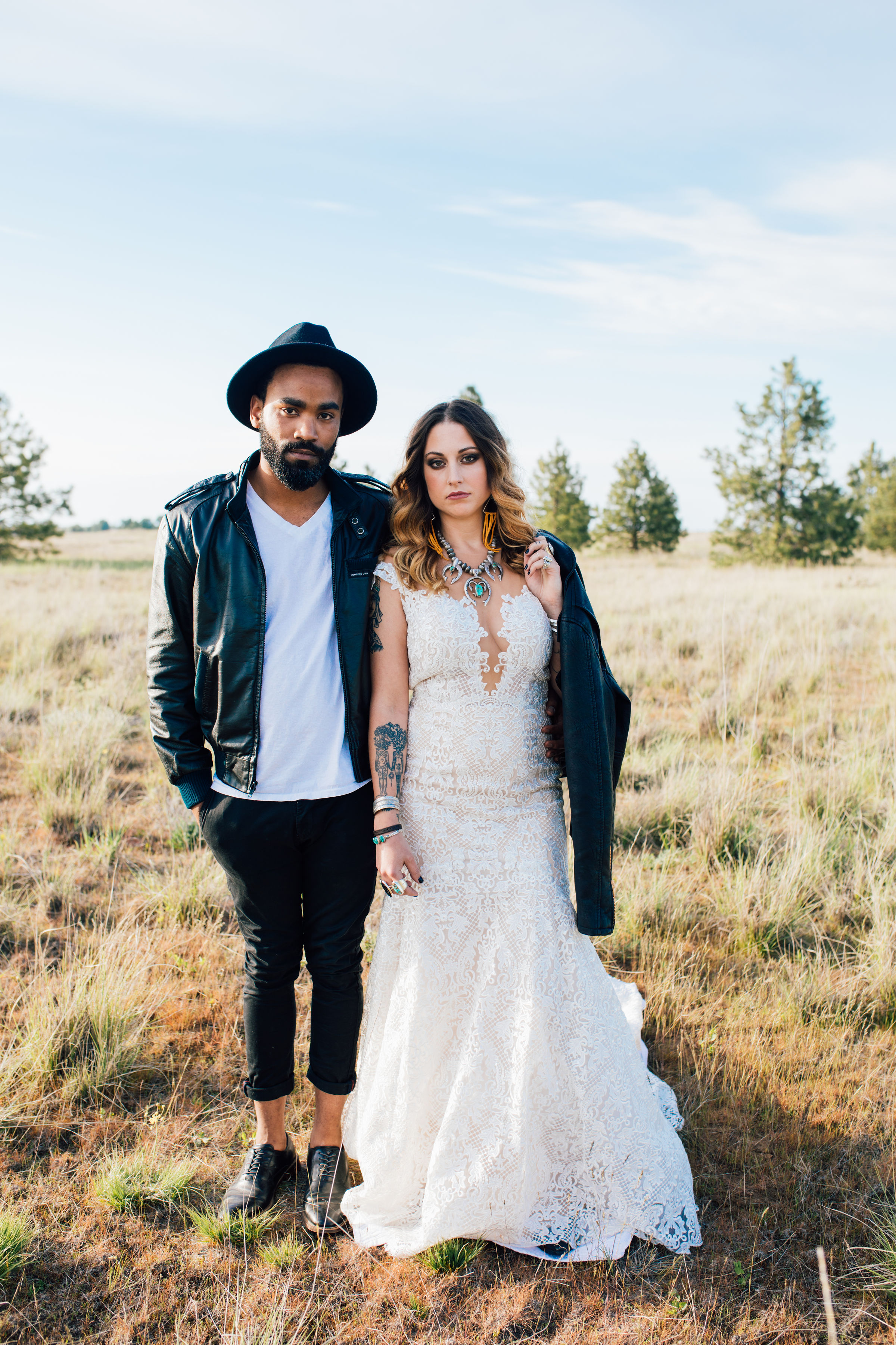 cool elopement spokane wedding couple portraits standing in field