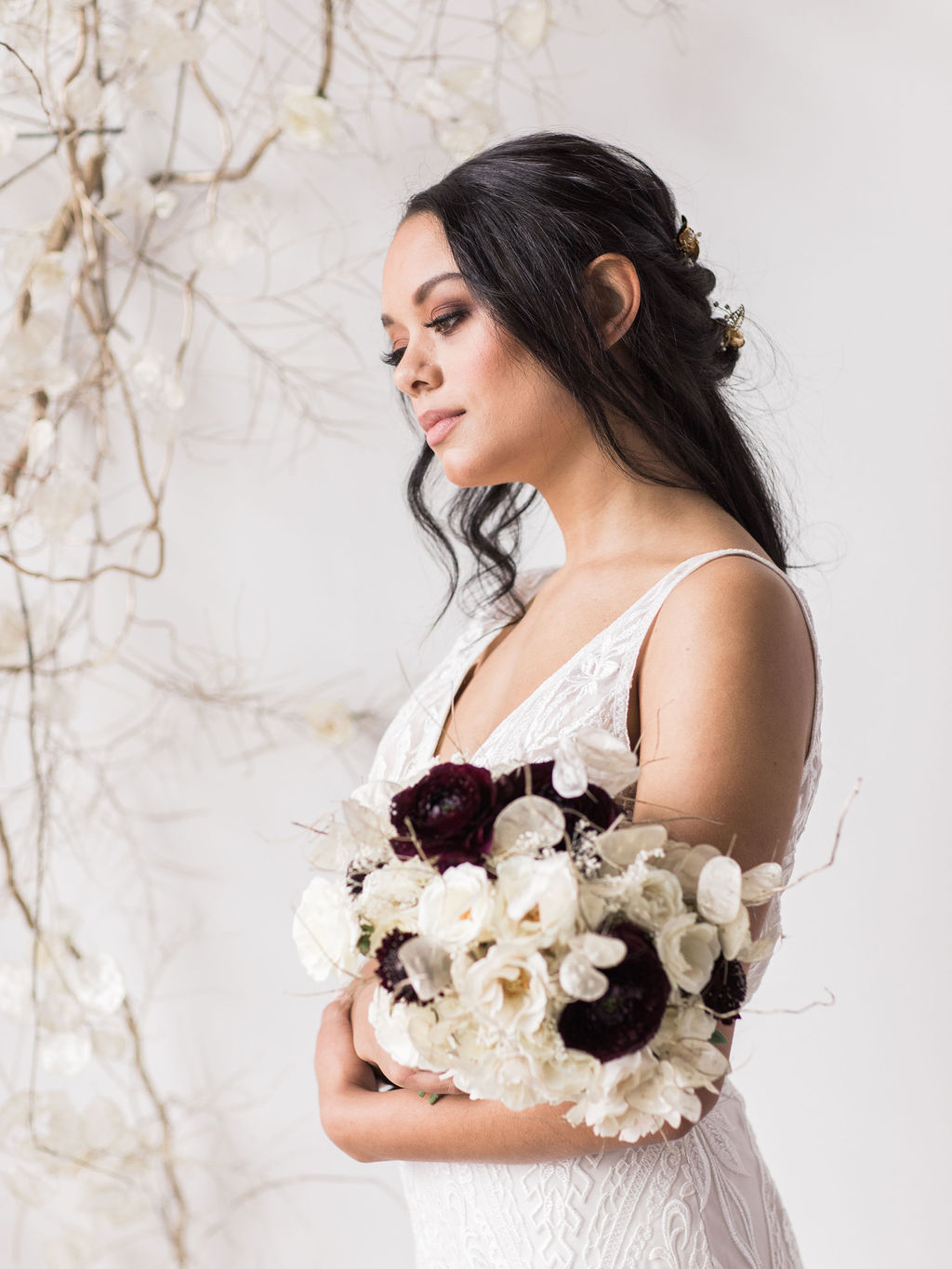 Dark hair bride with floral bouquet wedding spokane
