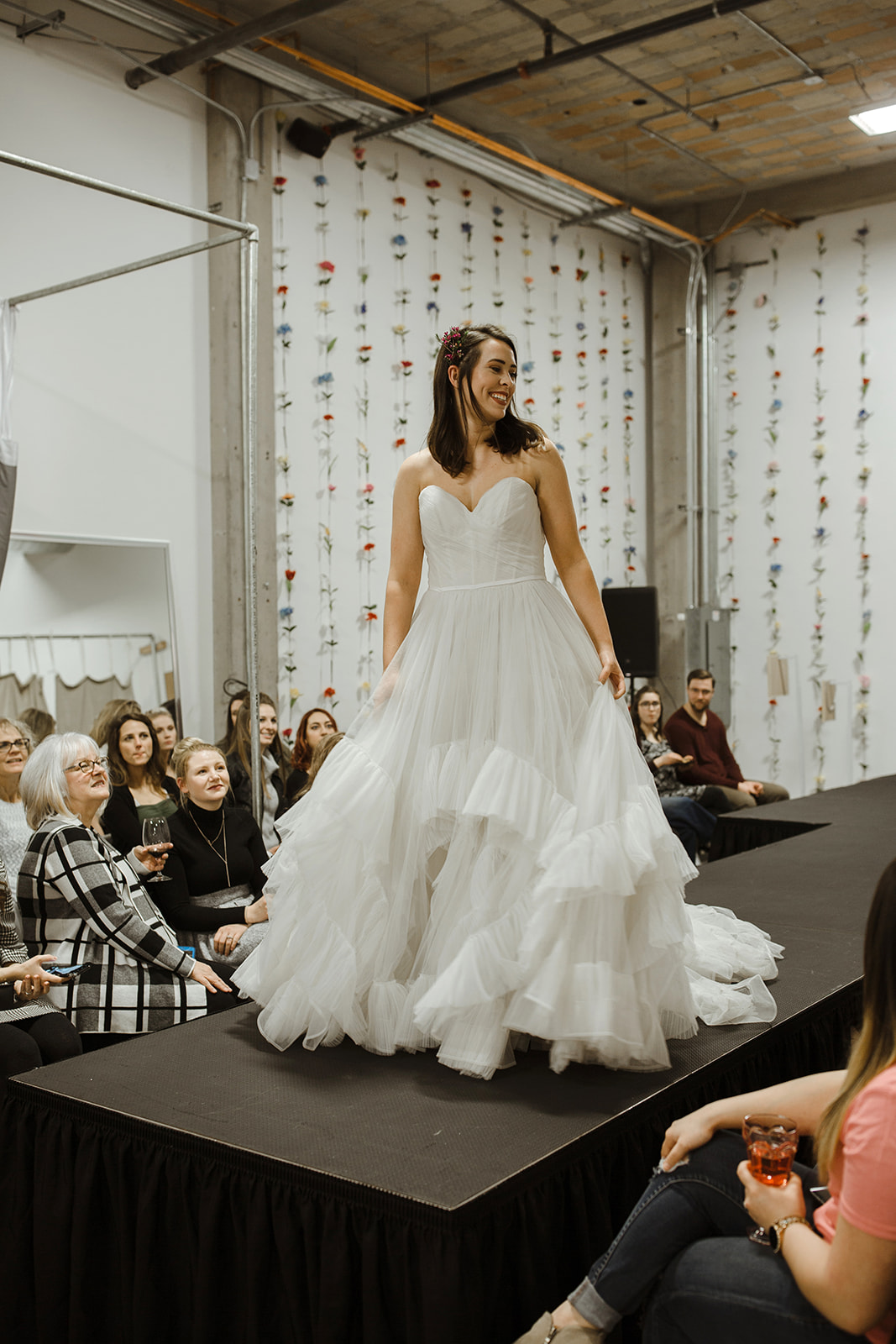 spokane wedding dress flower in hair twirl fashion show