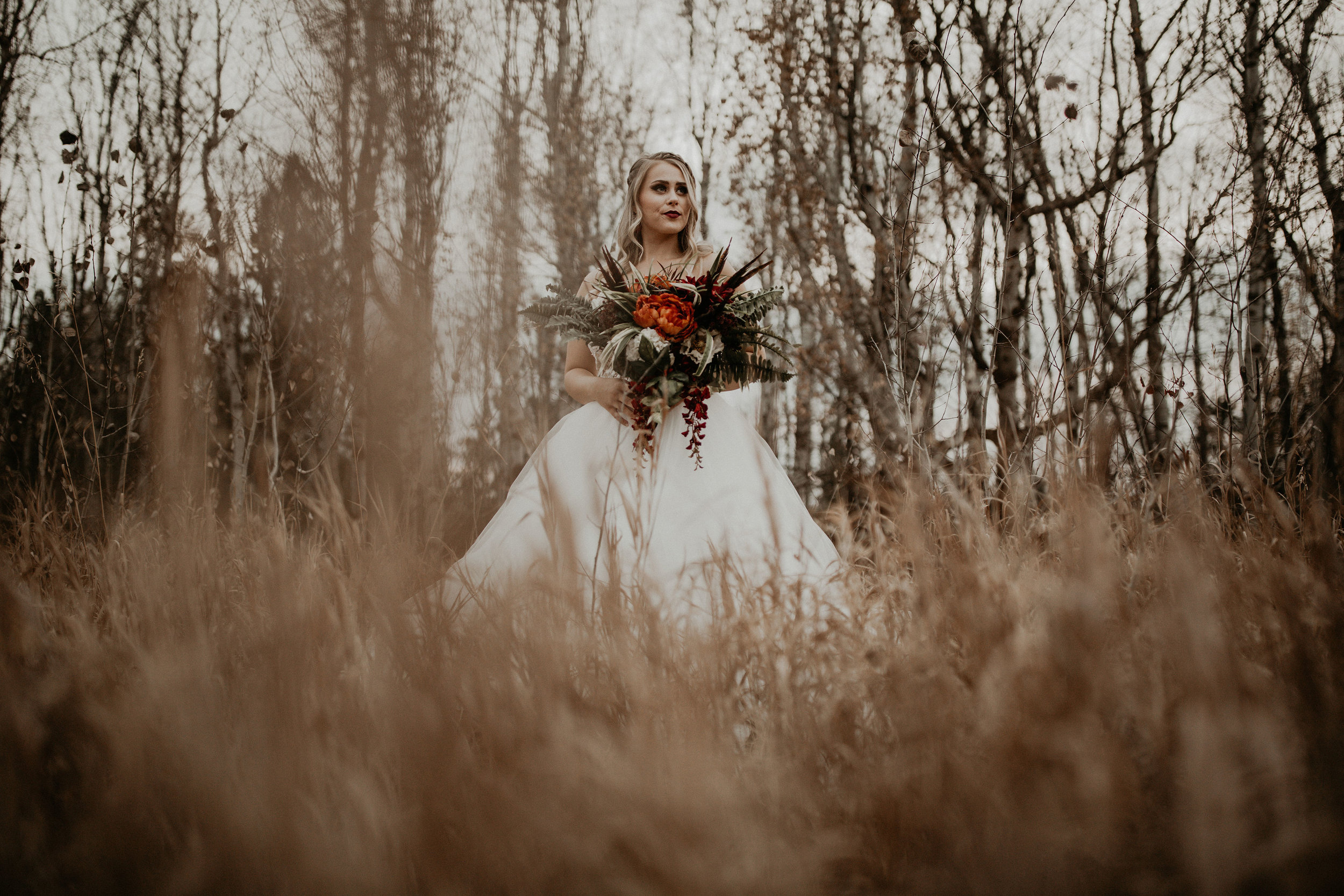 Spokane Fall wedding dress image in a field