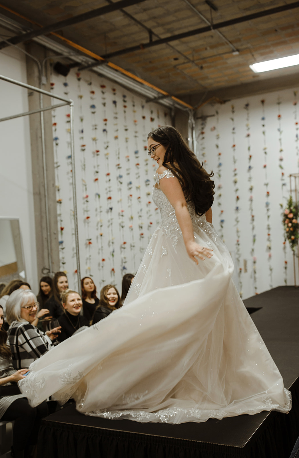 spokane wedding dress twirling end of runway fashion show