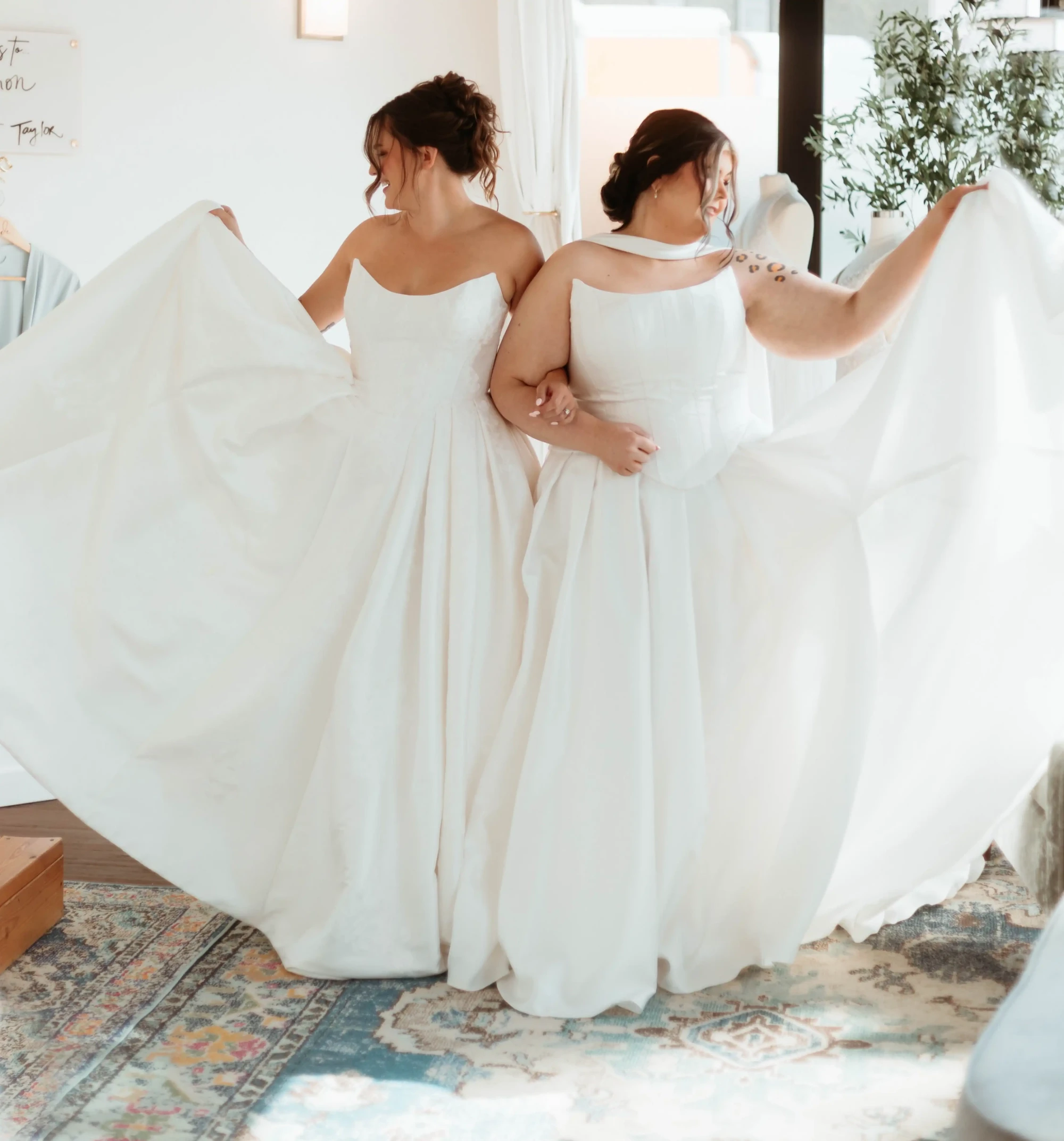 Models wearing a white dresses