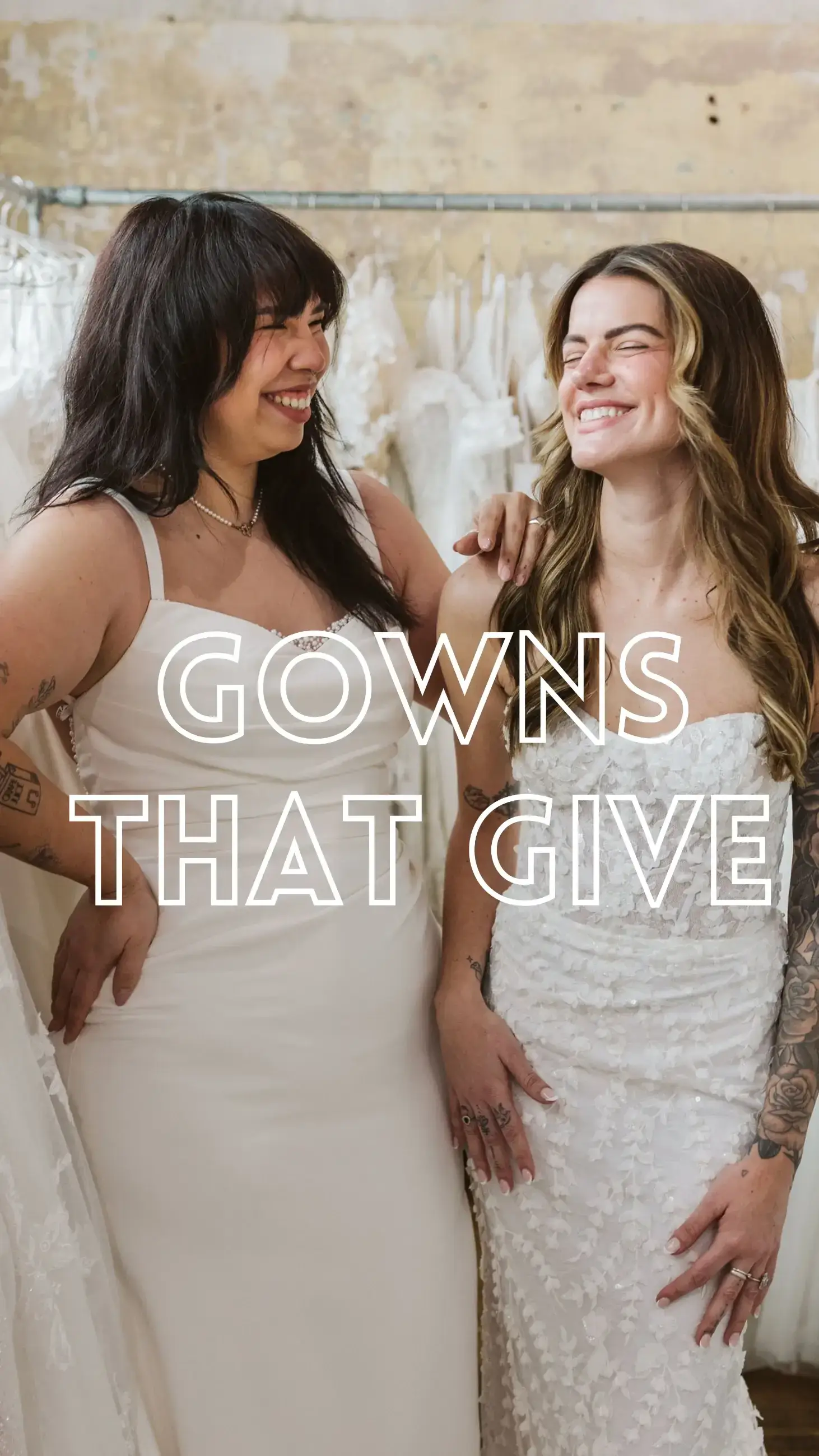 image shows two models wearing wedding dresses smiling at each other promoting the gowns that give initiative at honest in ivory