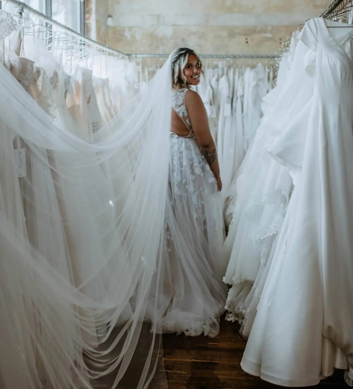 Model wearing a white bridal dress